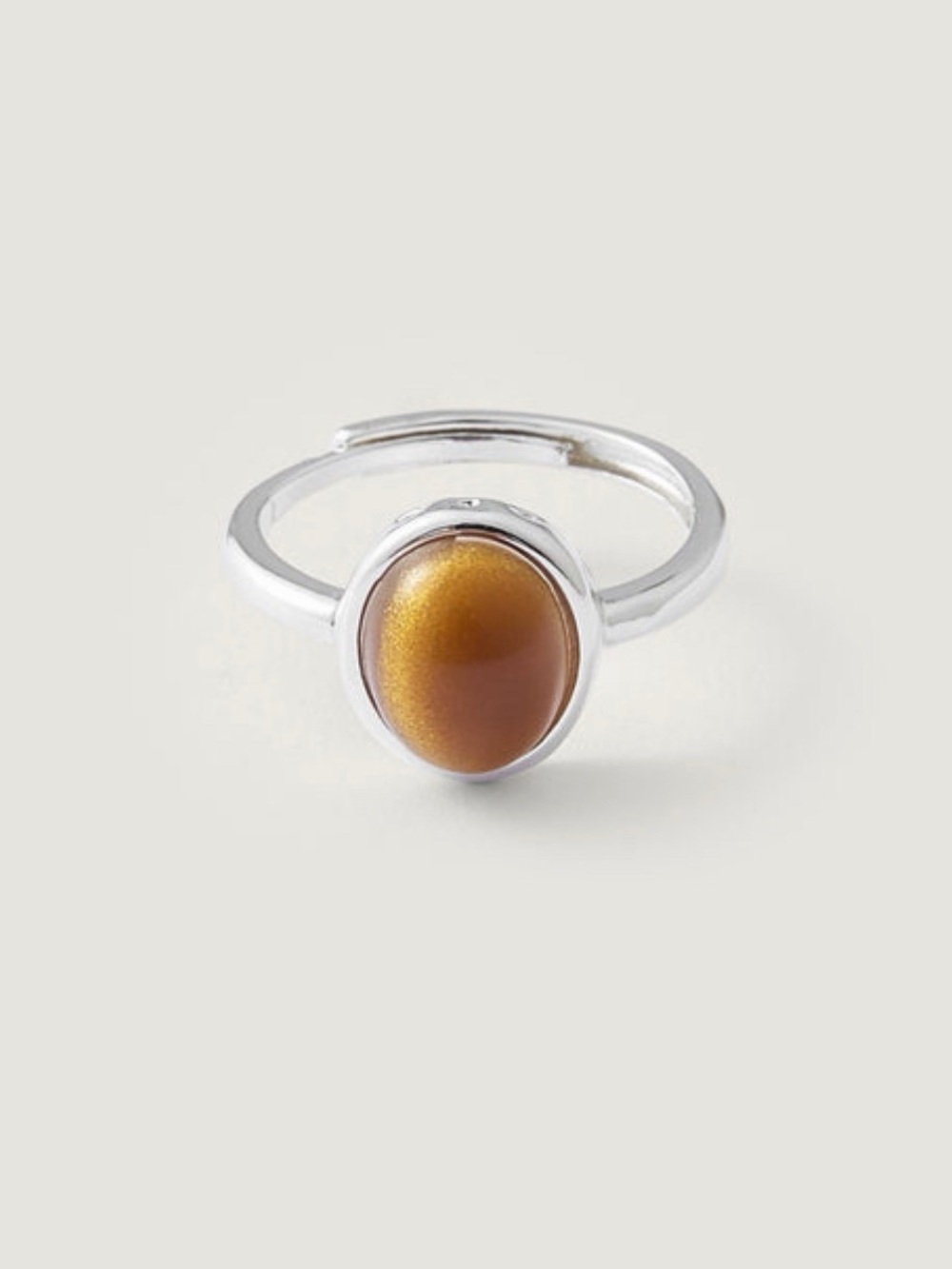 Adjustable Silver Tone Ring with Amber Cat's Eye Stone